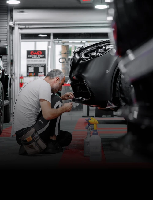 Hand washing a wrapped vehicle to prevent sun and salt damage